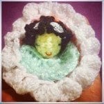 crochet baby in bassinet